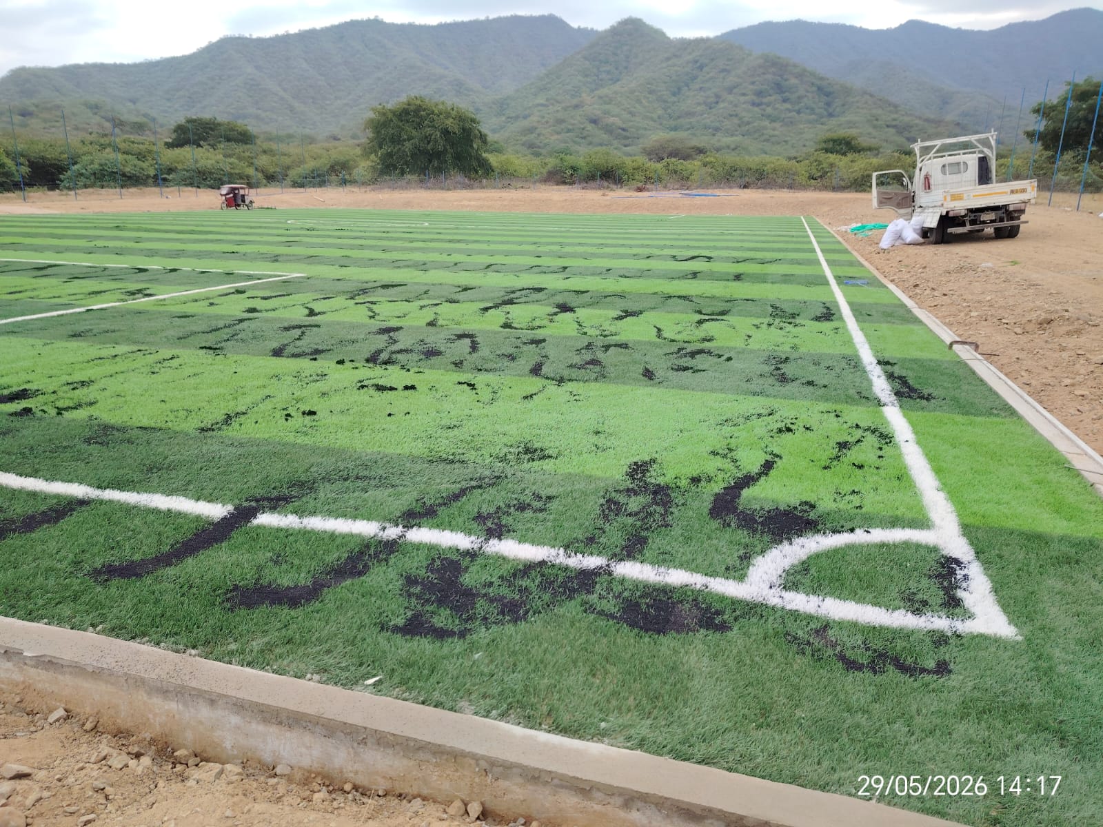 Colocación de grass sintético y relleno granulado